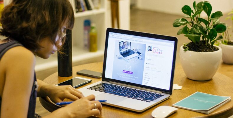 woman browsing on her laptop